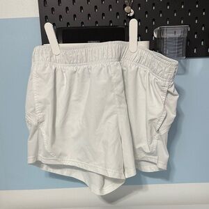 Large white athletic works running shorts